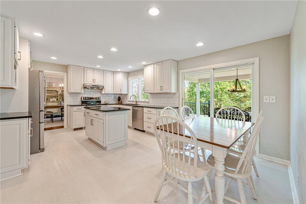 103 Lexington Drive Canonsburg, PA 15317 - Photo 2 of 44 a kitchen with white cabinets and stainless steel appliances