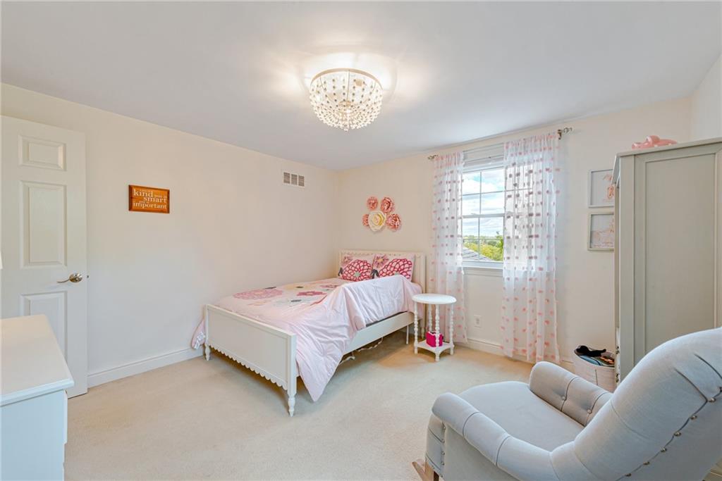 103 Lexington Drive Canonsburg, PA 15317 - Photo 30 of 44 a bedroom with a bed and a couch