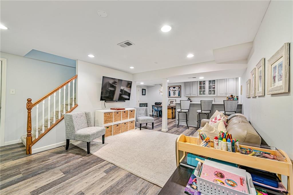 103 Lexington Drive Canonsburg, PA 15317 - Photo 34 of 44 a living room with furniture and a flat screen tv