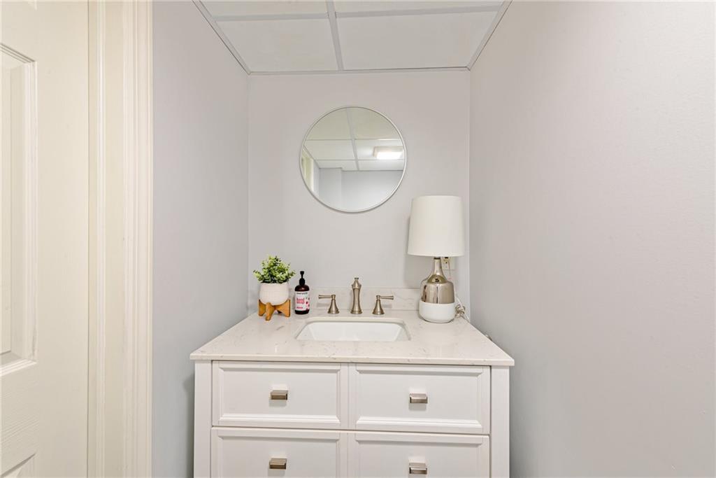 103 Lexington Drive Canonsburg, PA 15317 - Photo 36 of 44 a bathroom with a sink and a mirror
