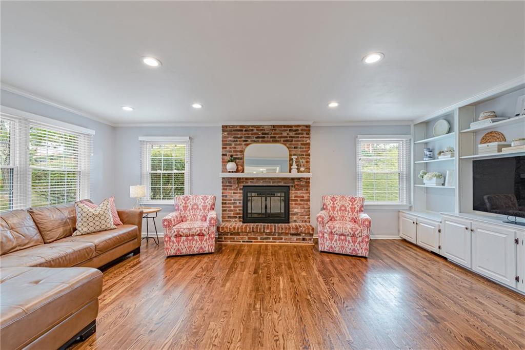 103 Lexington Drive Canonsburg, PA 15317 - Photo 5 of 44 a living room with furniture a flat screen tv and a fireplace