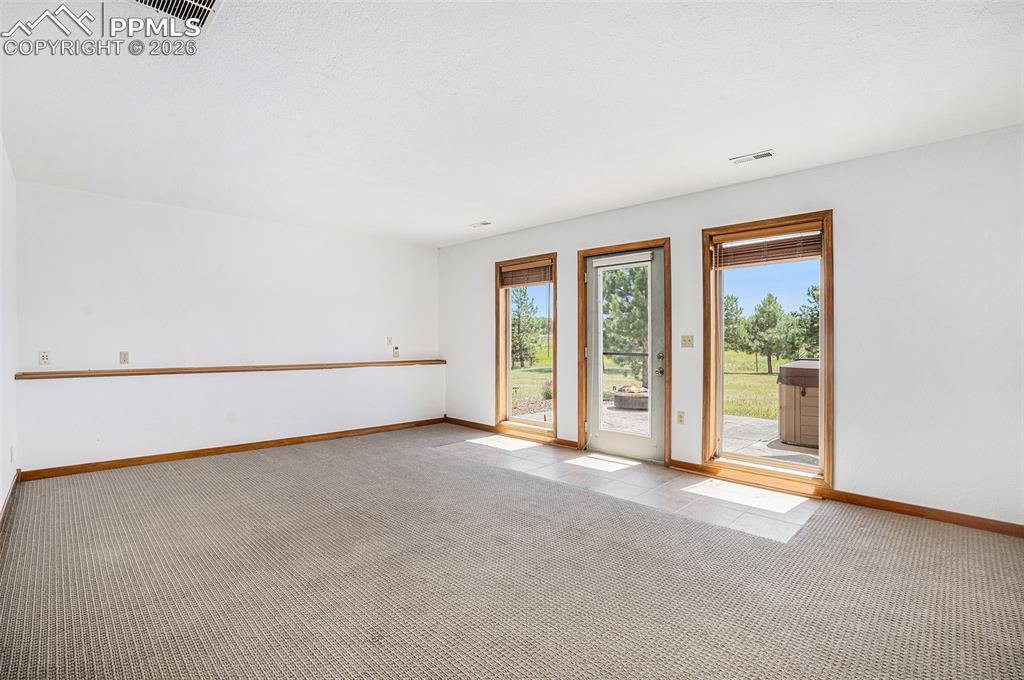 2585 Mohawk Way Monument, CO 80132 - Photo 31 of 49 an empty room with a window
