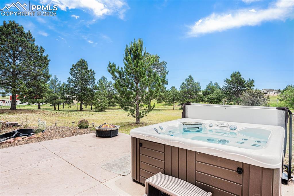 2585 Mohawk Way Monument, CO 80132 - Photo 32 of 49 a view of a terrace with sitting area