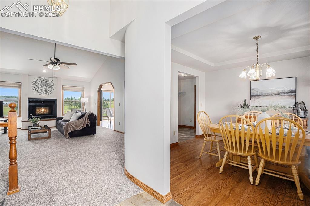 2585 Mohawk Way Monument, CO 80132 - Photo 5 of 49 a view of livingroom with furniture and chandelier