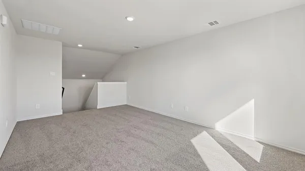 a kitchen with a sink and a refrigerator