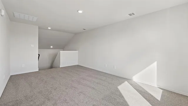a kitchen with a sink and a refrigerator