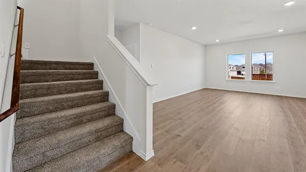 a view of entryway with wooden floor
