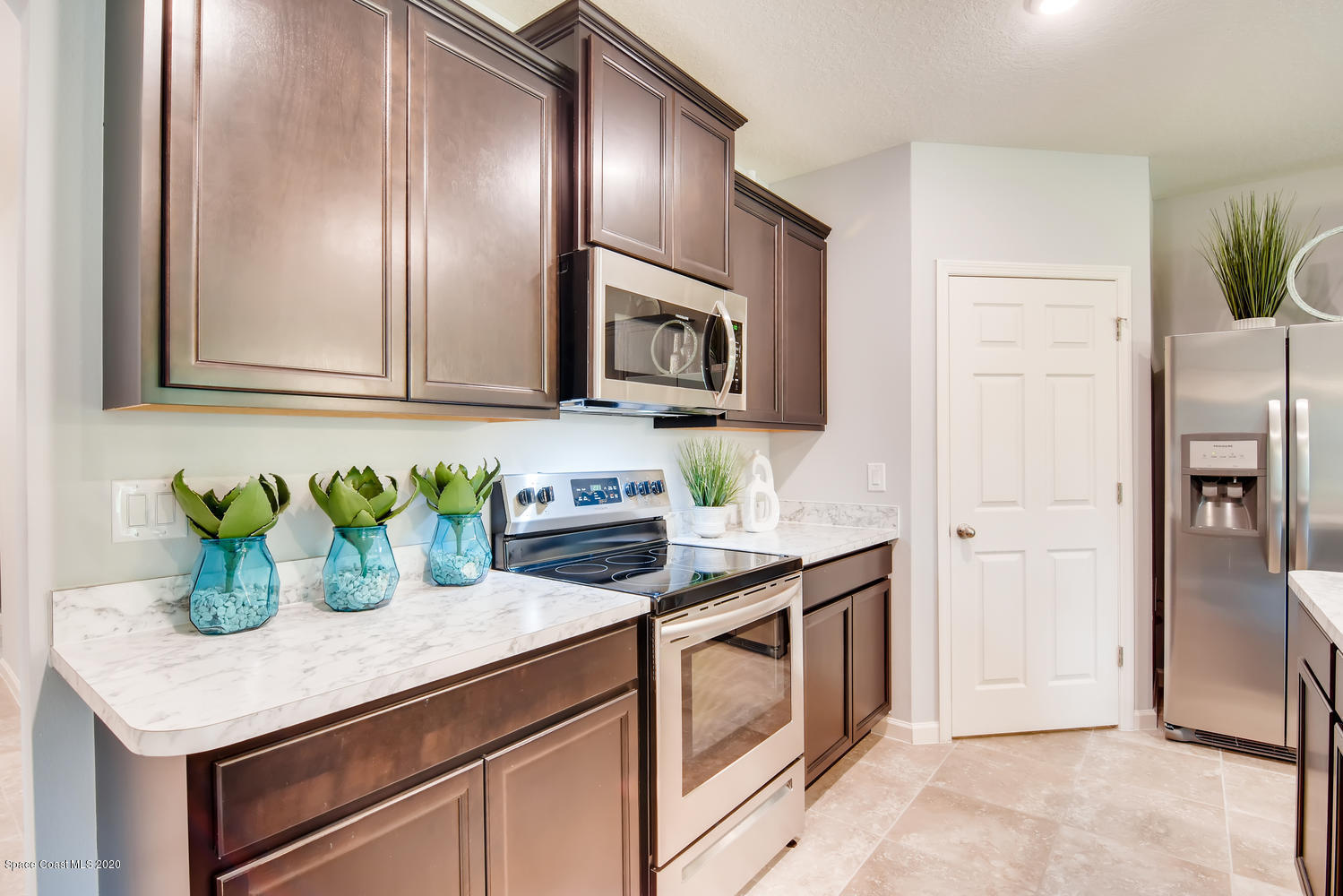 1742 Saxton Road Cocoa, FL 32926 - Photo 4 of 24 4 Cali Plan-large-004-007-Kitchen-1500x1