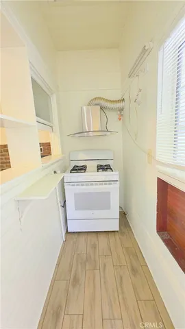 a bathroom with a tub sink and a mirror