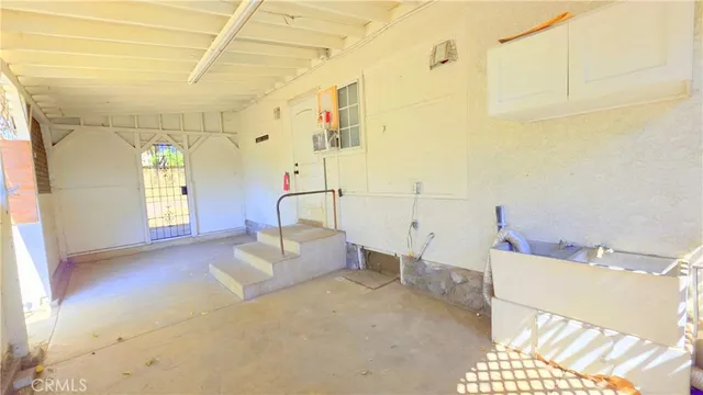 a view of a yard with swimming pool