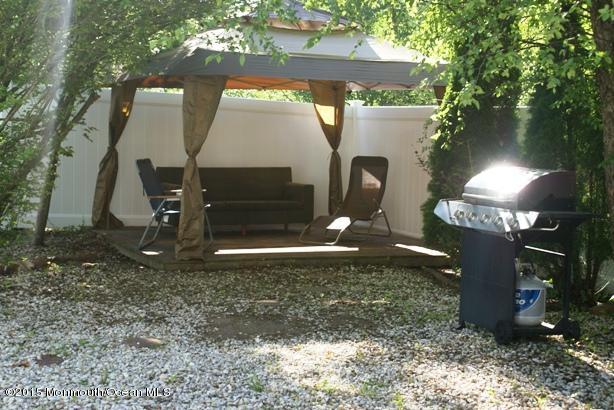 132 Starlight Road Howell, NJ 07731 - Photo 24 of 25 Backyard deck