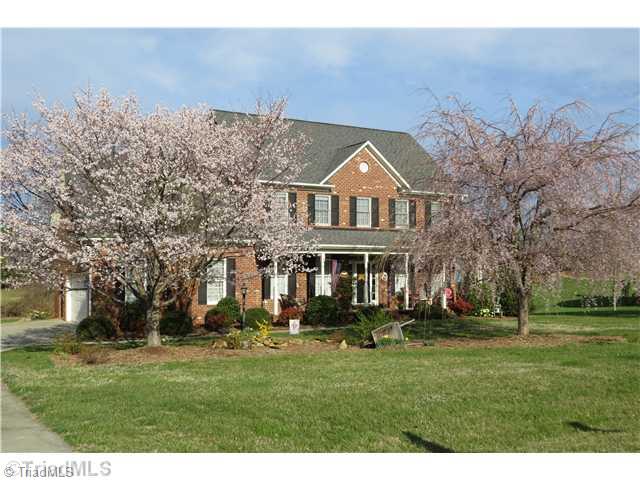 Exterior Front. LARGE FRONT YARD WITH WATER FEATURE
