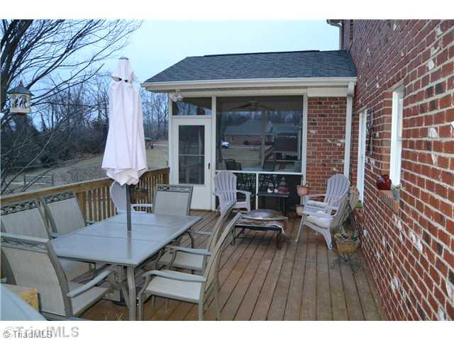 7497 Bethel View Court Oak Ridge, NC 27310 - Photo 15 of 16 Screened Porch. ENJOY THE OUTSIDE IN THE SUN OR BUG FREE