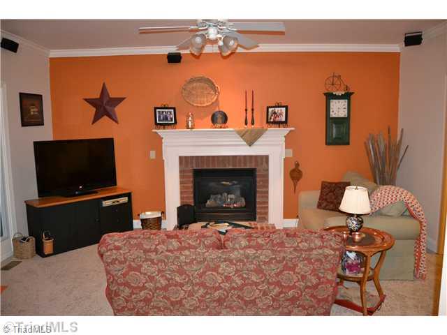 7497 Bethel View Court Oak Ridge, NC 27310 - Photo 6 of 16 Den/Family/Great Room. GAS FIREPLACE AND NEW CARPETING