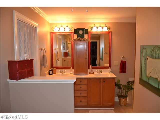 7497 Bethel View Court Oak Ridge, NC 27310 - Photo 10 of 16 Master Bath/Spa. DOUBLE VANITIES ALONG WITH SEPERATE SHOWER AND JETTED TUB