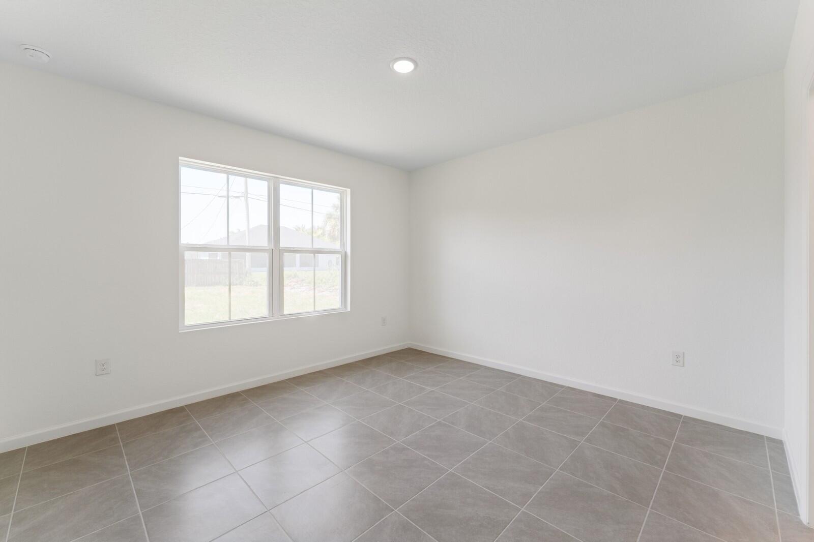 322 Southwest Becker Road, Unit 13 Port St. Lucie, FL 34953 - Photo 21 of 35 Primary Suite