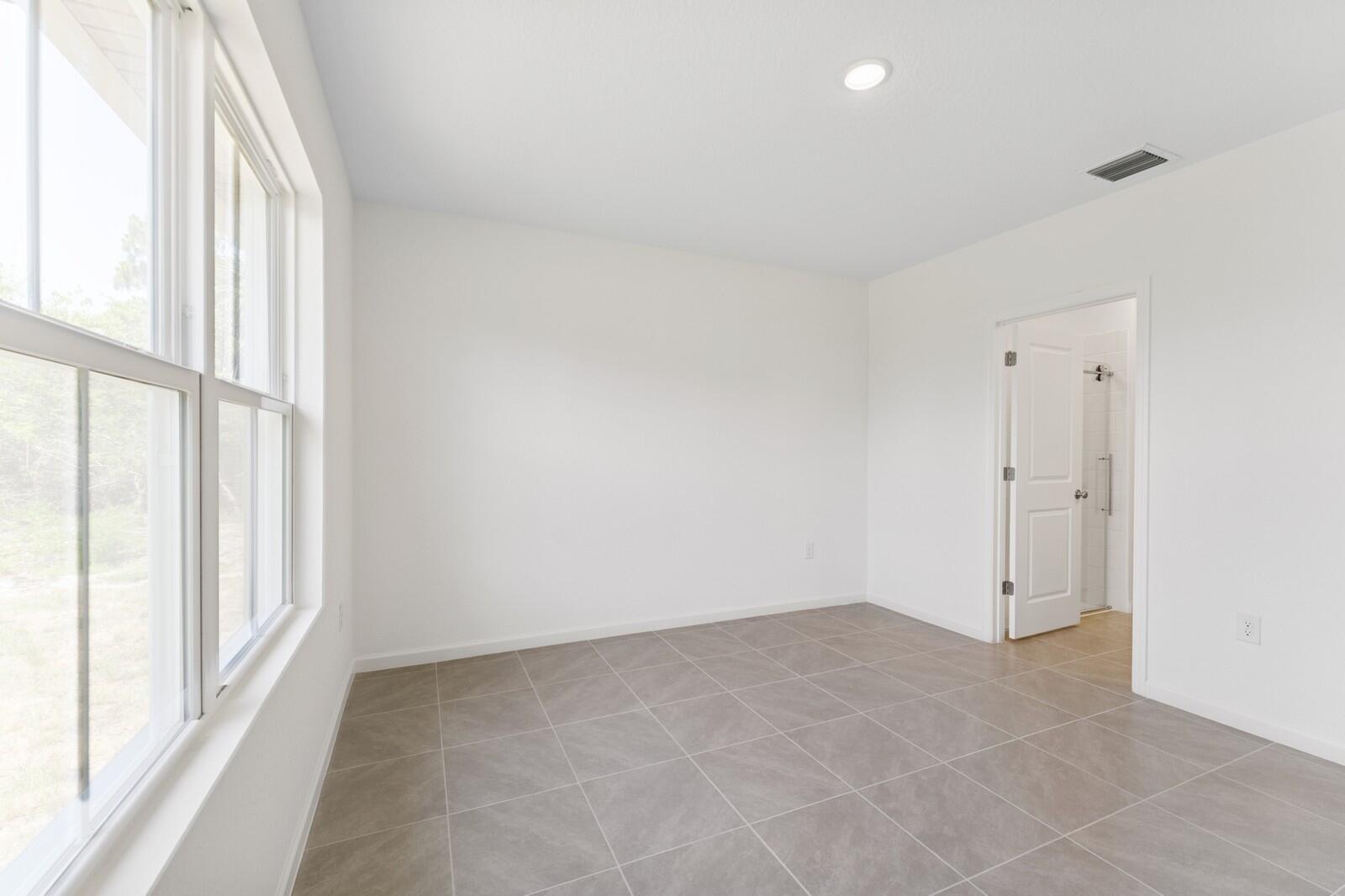 322 Southwest Becker Road, Unit 13 Port St. Lucie, FL 34953 - Photo 23 of 35 Primary Suite