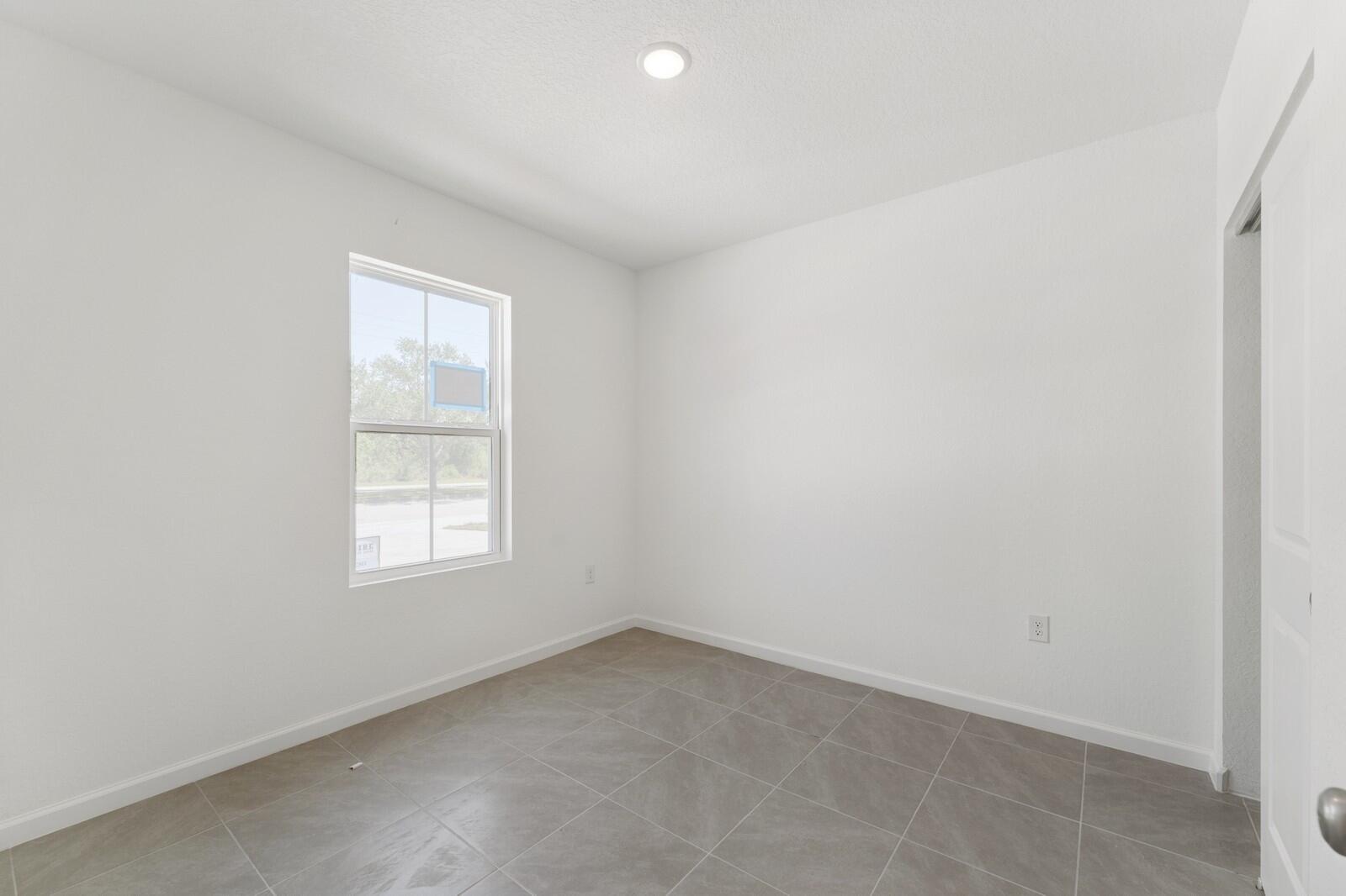 322 Southwest Becker Road, Unit 13 Port St. Lucie, FL 34953 - Photo 5 of 35 Bedroom 2
