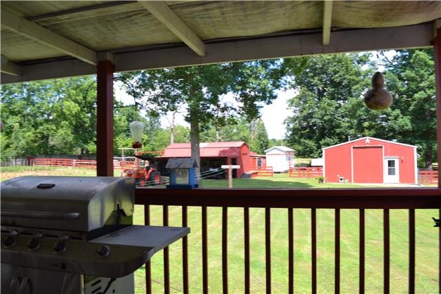 670 Capps Road McEwen, TN 37101 - Photo 5 of 20 5 out buildings, all are wired for electricity and the large metal building has gas heat, a window AC unit and a half bath with water.