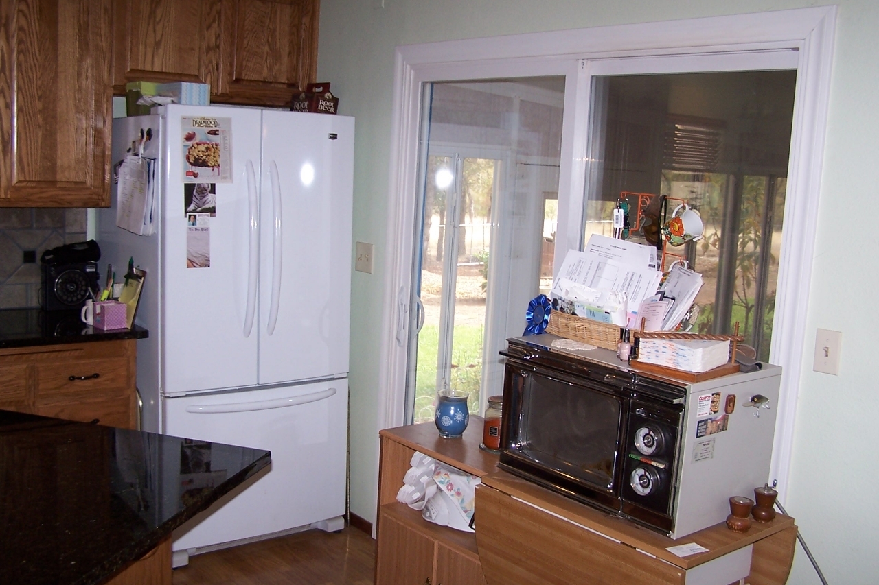 Kitchen door to enclosed 11x17 patio