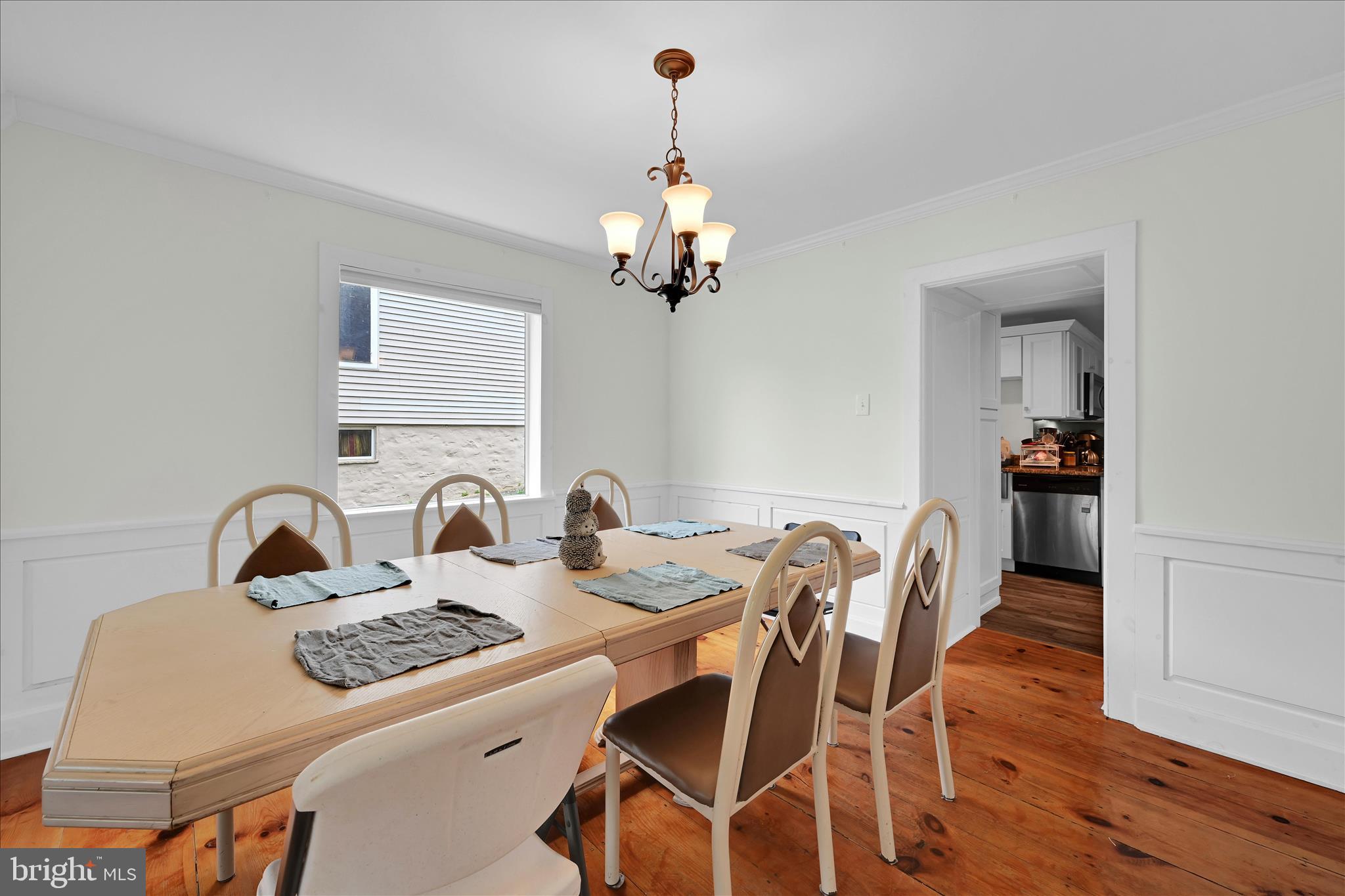 286 Schuylkill Road Birdsboro, PA 19508 - Photo 12 of 39 a view of a dining room with furniture wooden floor and chandelier
