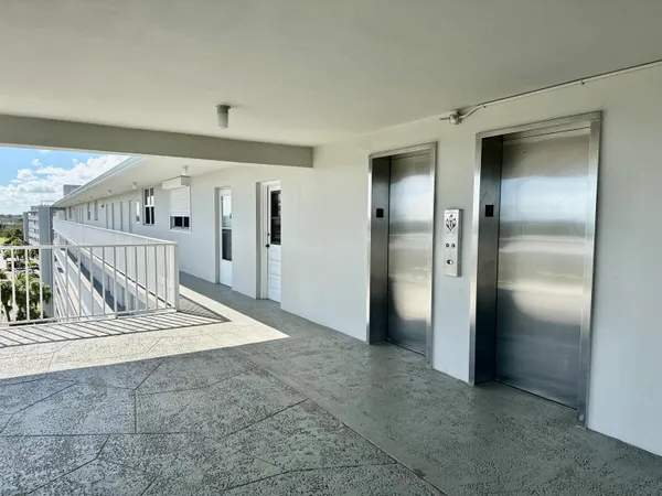 a view of a hallway view with staircase