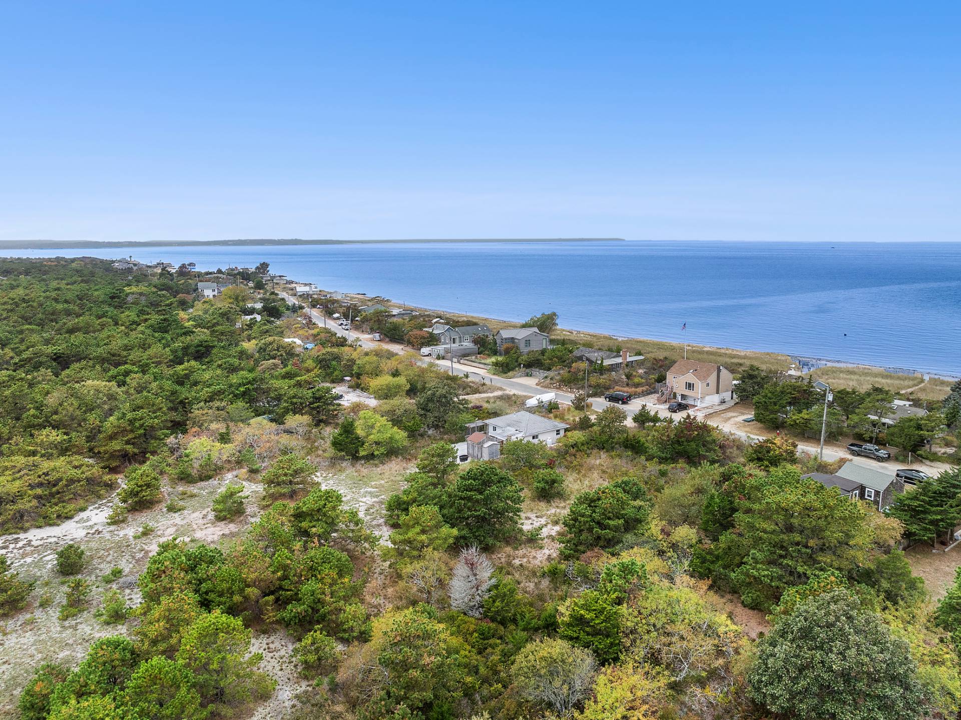 203 Shore Road Amagansett, NY 11930 - Photo 20 of 20 a view of a large body of water with lots of trees