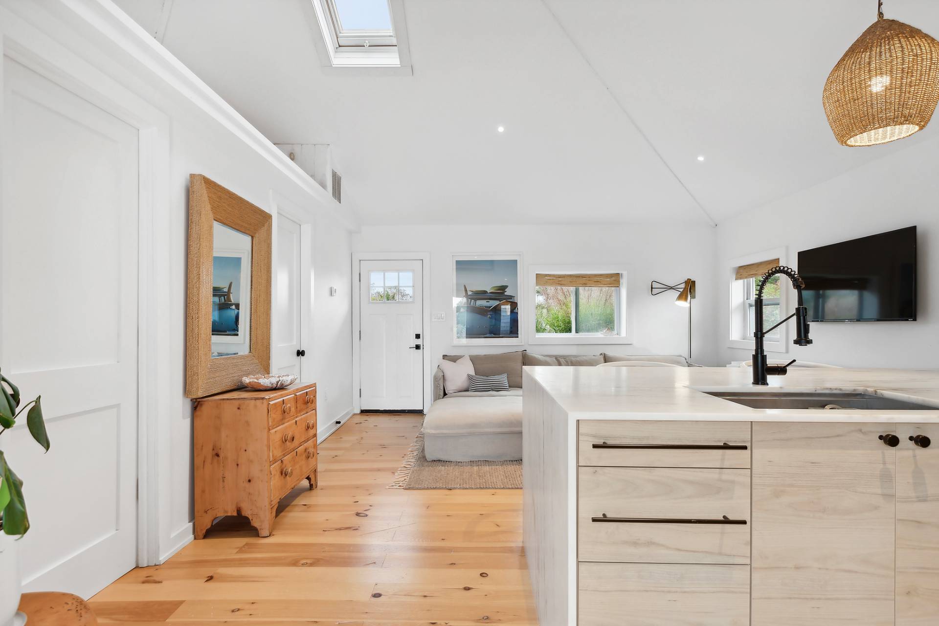 203 Shore Road Amagansett, NY 11930 - Photo 3 of 20 a living room with furniture and flat screen tv