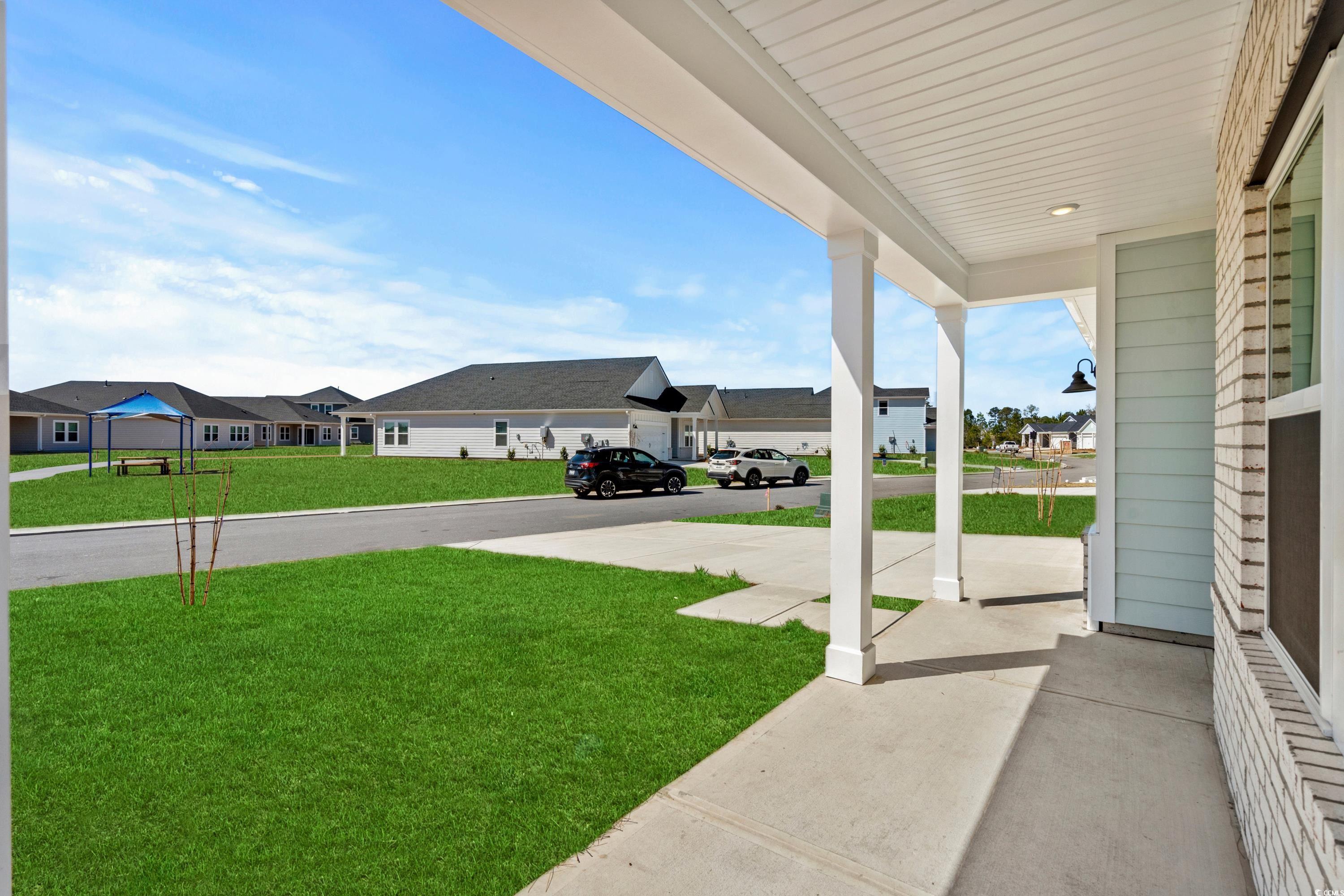 2052 Copper Crk Loop Longs, SC 29568 - Photo 2 of 40 View of yard featuring a residential view