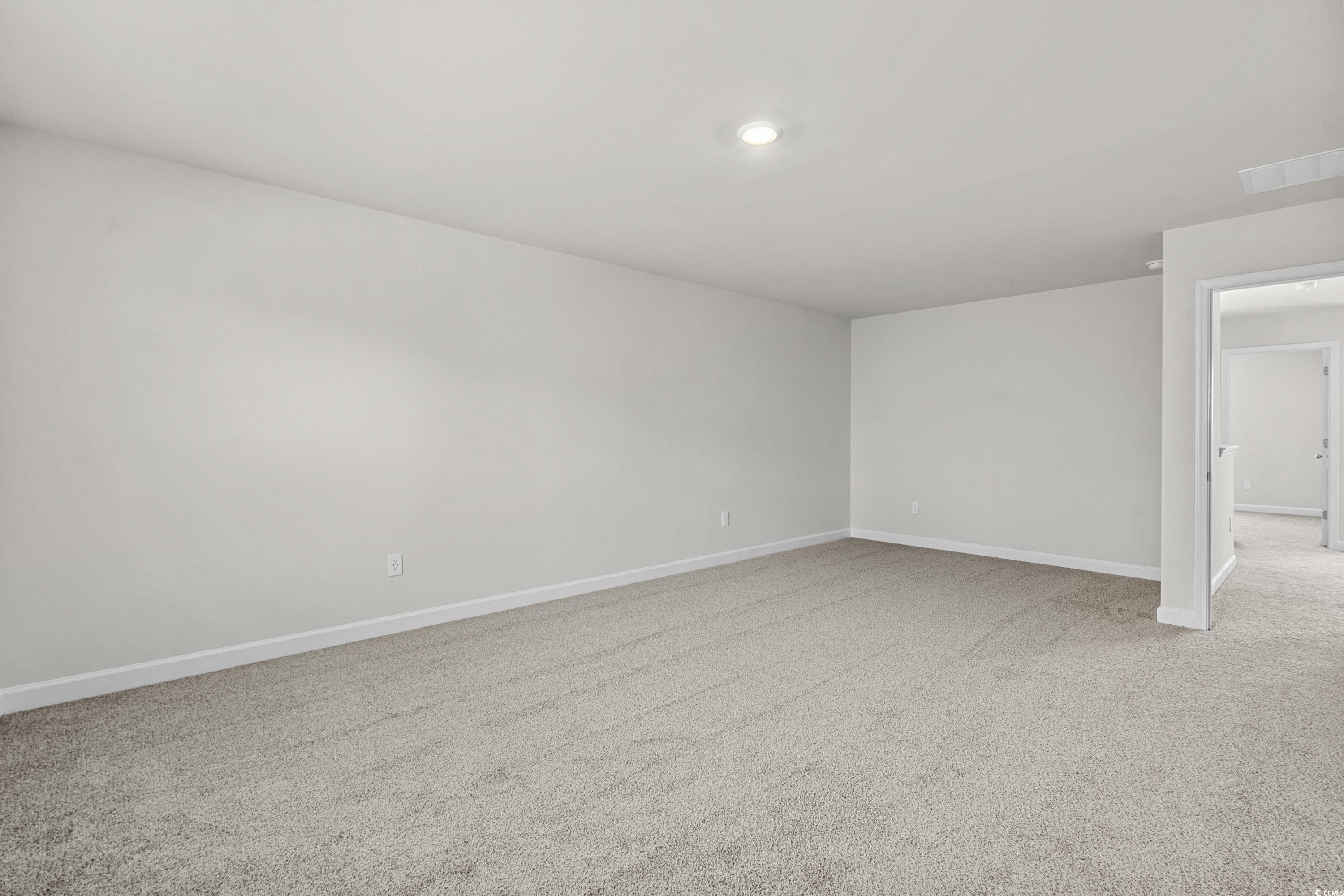 2052 Copper Crk Loop Longs, SC 29568 - Photo 22 of 40 Carpeted empty room featuring baseboards