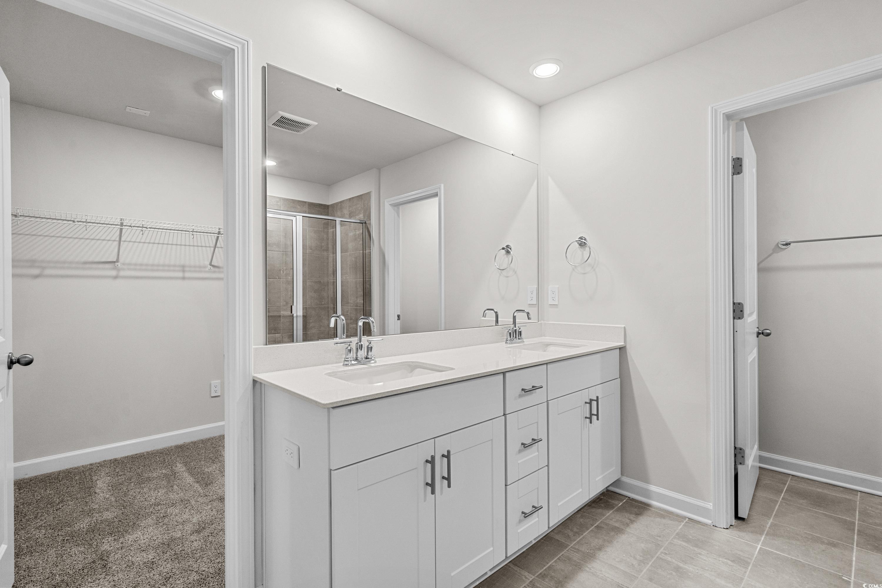 2052 Copper Crk Loop Longs, SC 29568 - Photo 24 of 40 Full bath featuring a spacious closet, double vani