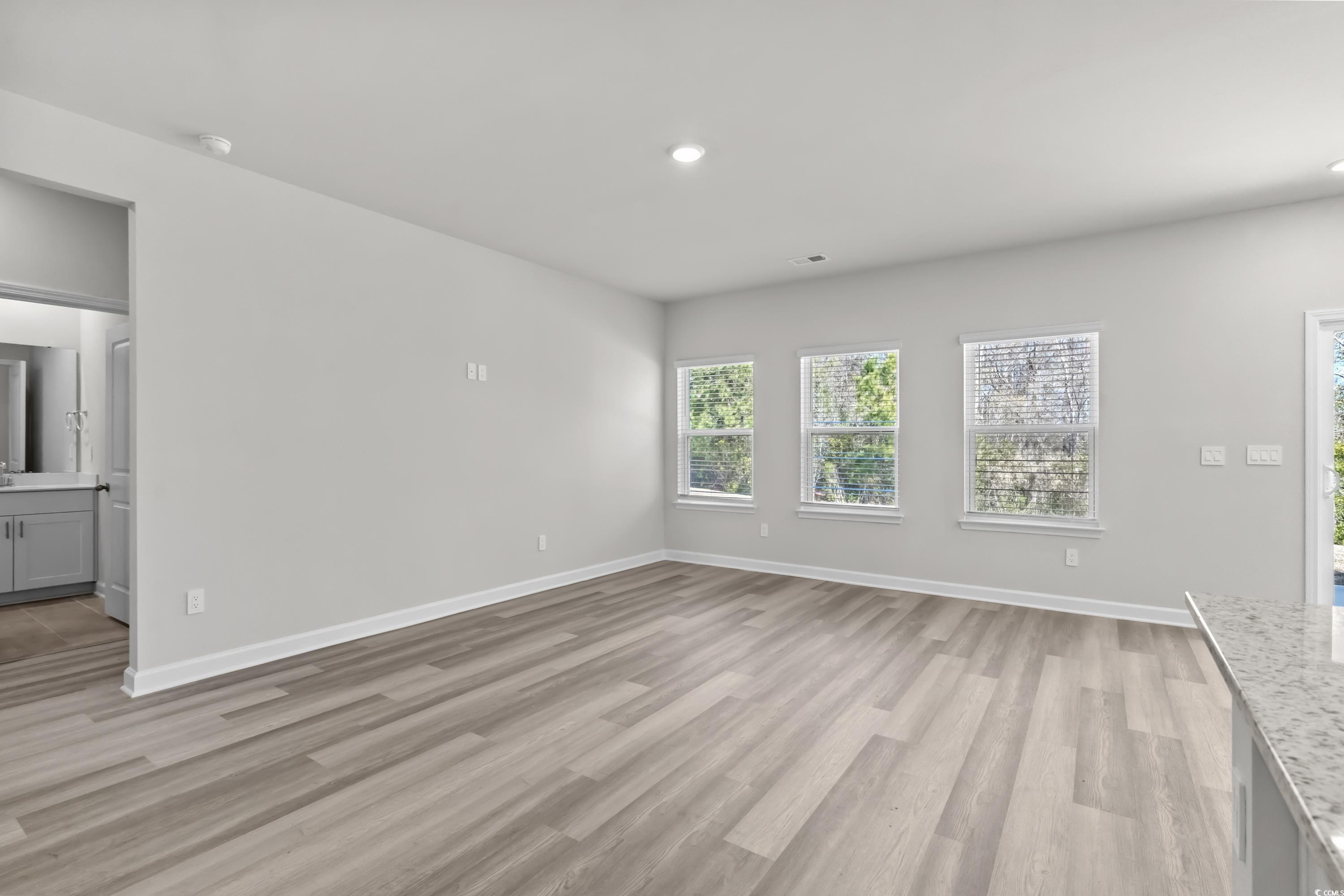 2052 Copper Crk Loop Longs, SC 29568 - Photo 7 of 40 Interior space featuring light wood finished floor