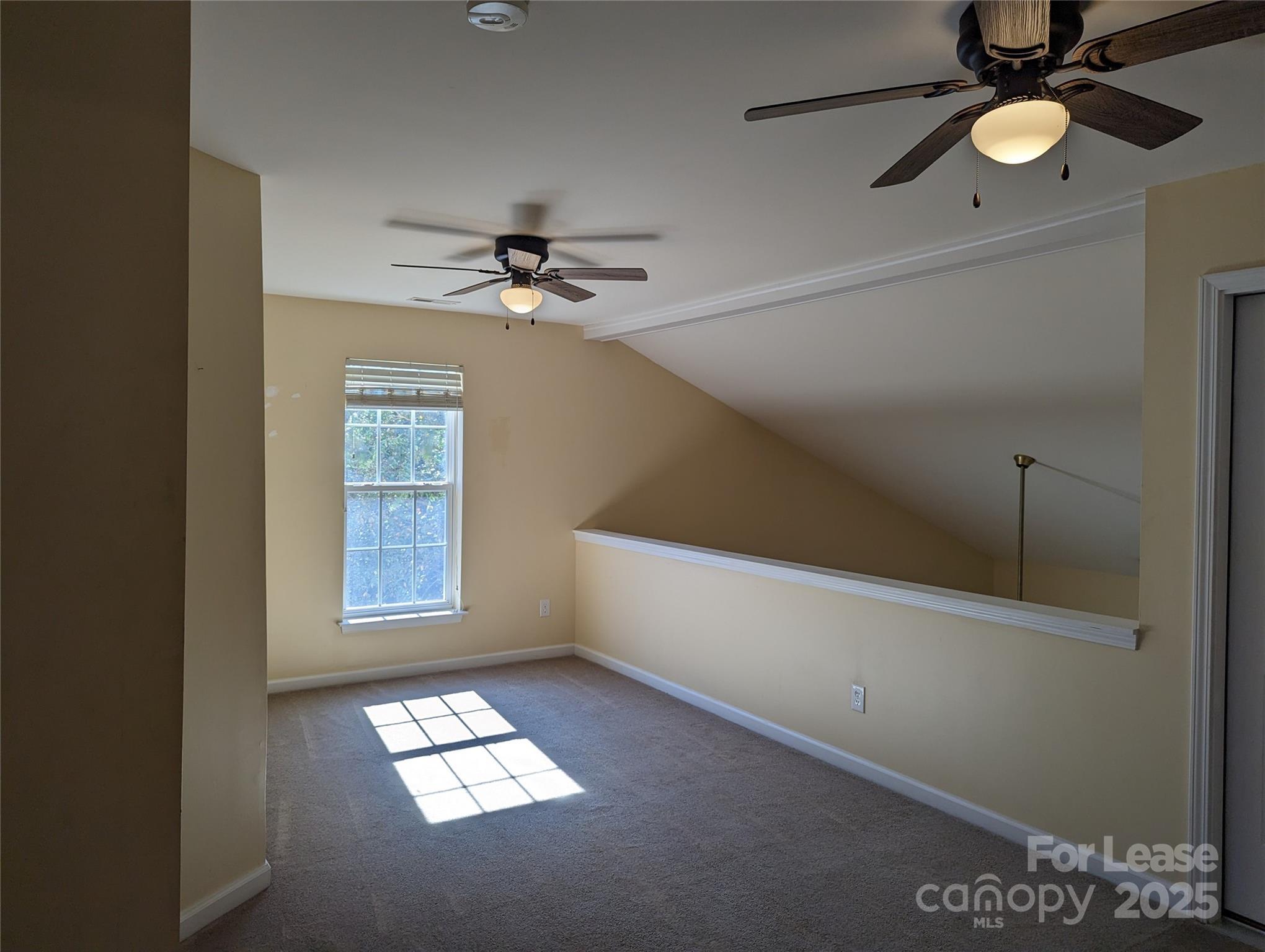 7920 Mariners Pointe Circle Denver, NC 28037 - Photo 17 of 21 a view of an empty room with a window