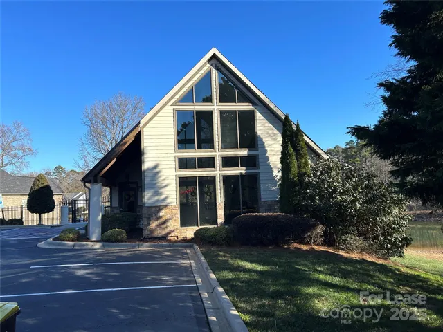 a terrace with outdoor seating and city view