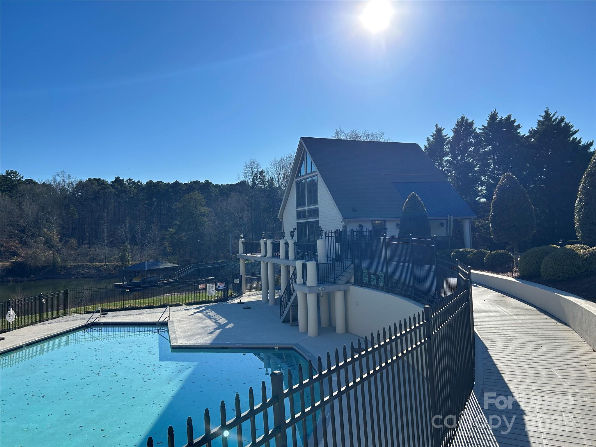7920 Mariners Pointe Circle Denver, NC 28037 - Photo 20 of 21 a terrace with outdoor seating and city view