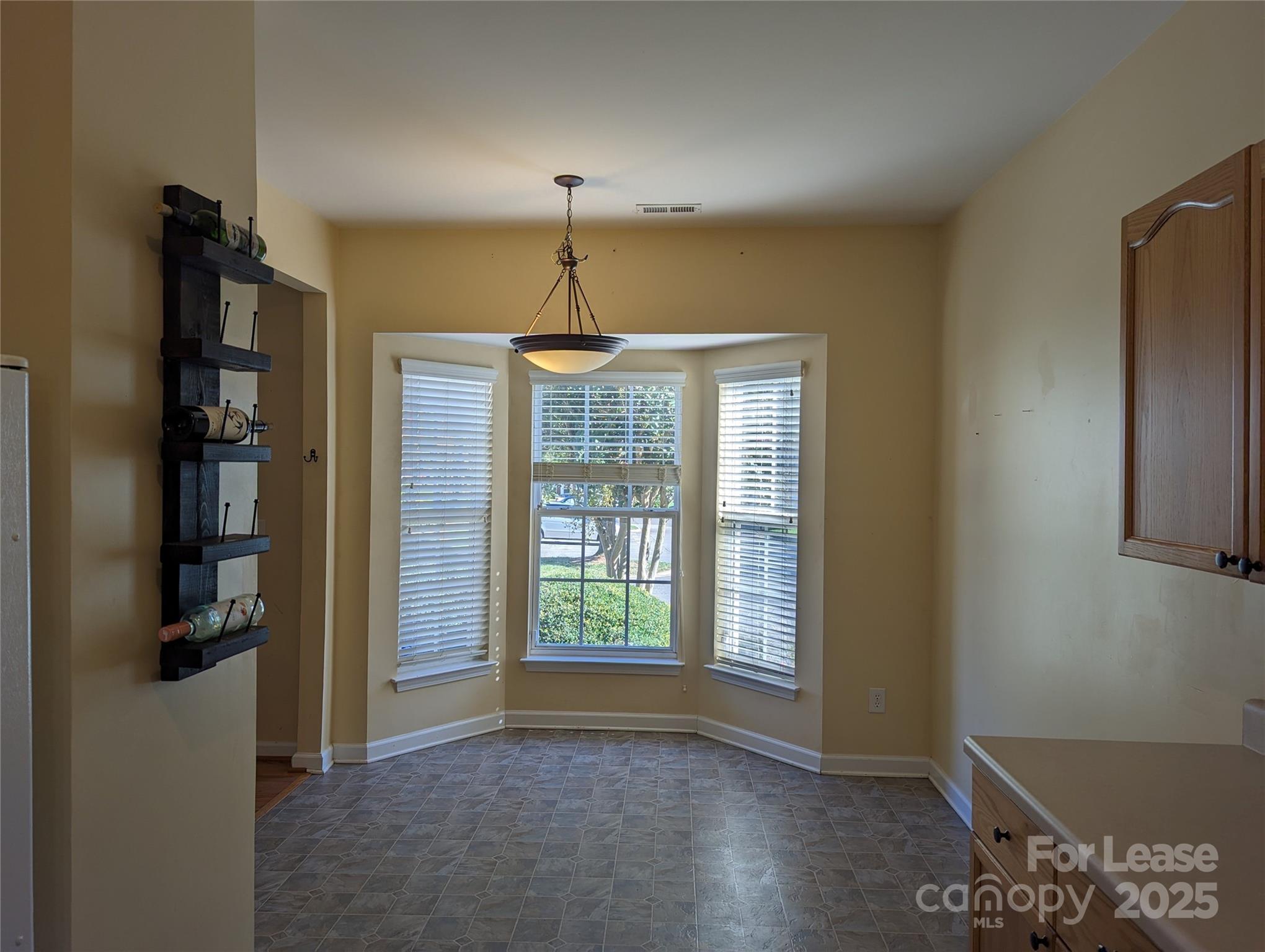 7920 Mariners Pointe Circle Denver, NC 28037 - Photo 3 of 21 a view of livingroom with window hardwood floor and hallway