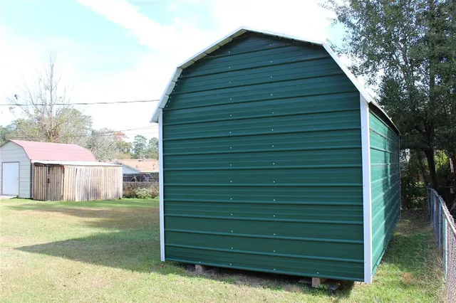 a bathroom with a shower and a mirror