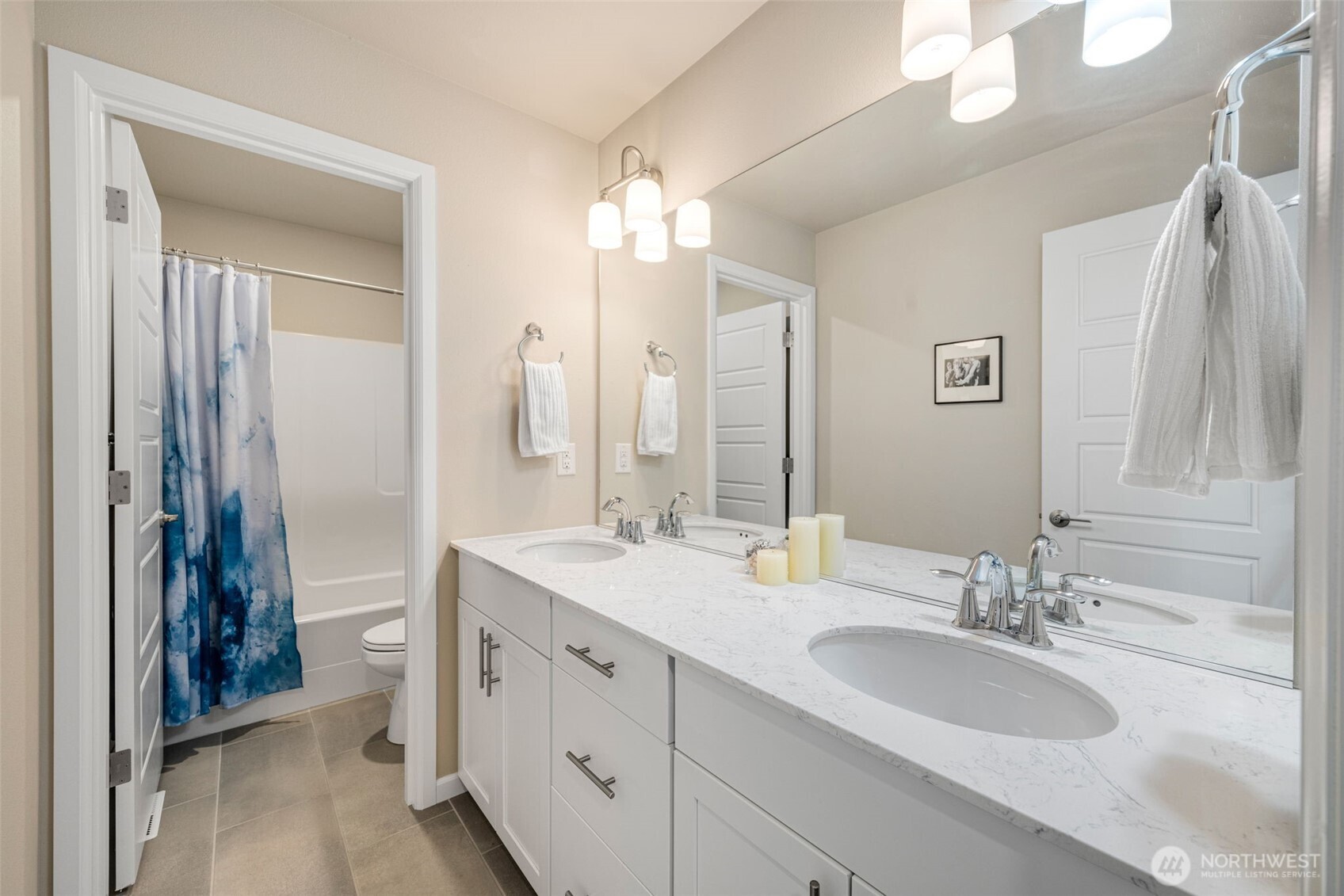 216 178th Street Southeast Bothell, WA 98012 - Photo 32 of 40 a bathroom with a double vanity sink mirror and double