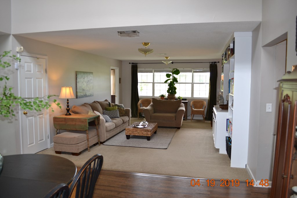 175 Kirkland Road Seale, AL 36875 - Photo 12 of 37 a living room with furniture and a large window