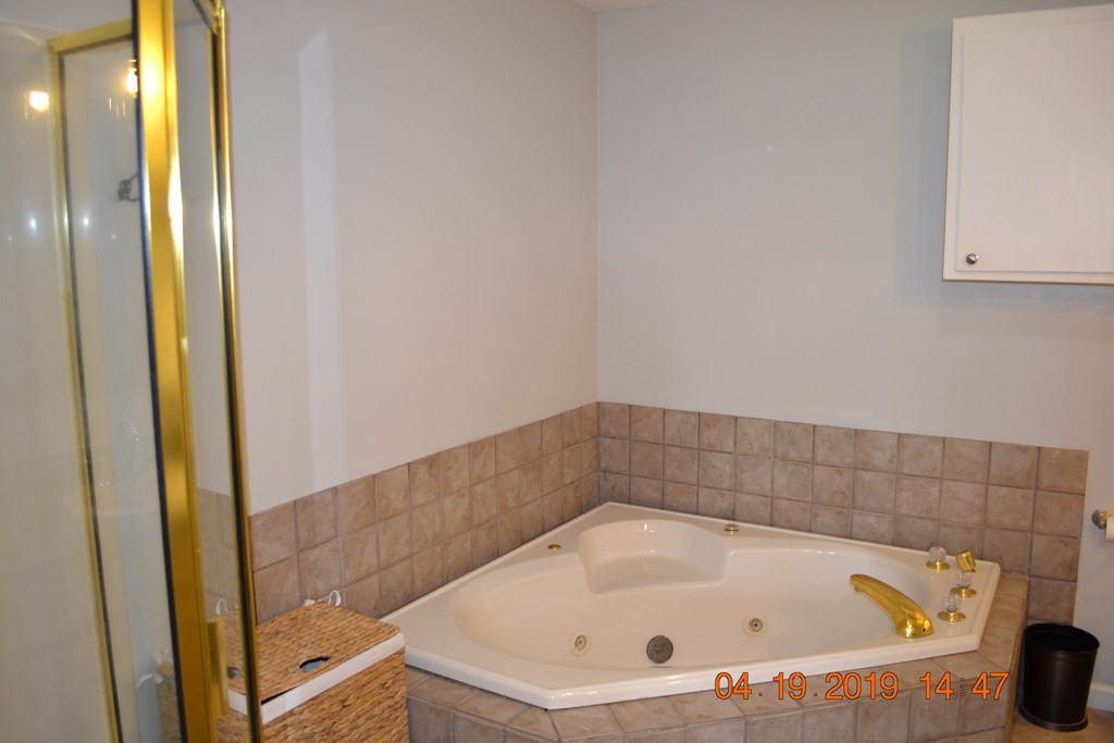 175 Kirkland Road Seale, AL 36875 - Photo 15 of 37 a bathroom with a bathtub