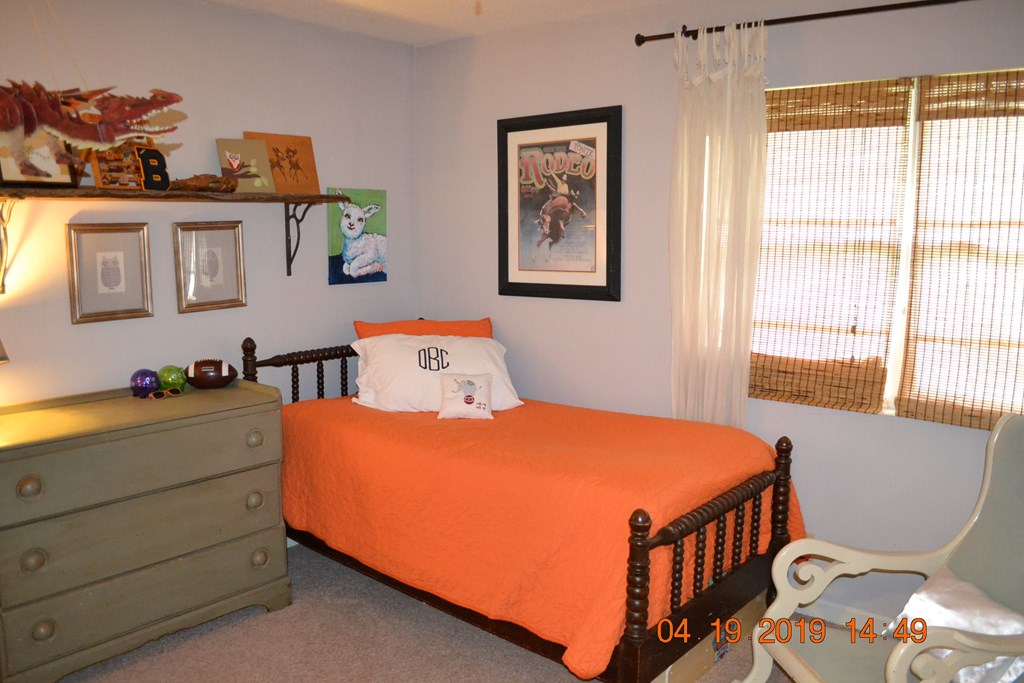 175 Kirkland Road Seale, AL 36875 - Photo 18 of 37 a bedroom with a bed and a window