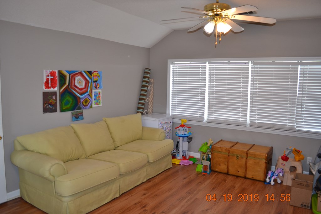 175 Kirkland Road Seale, AL 36875 - Photo 22 of 37 a living room with furniture and a window