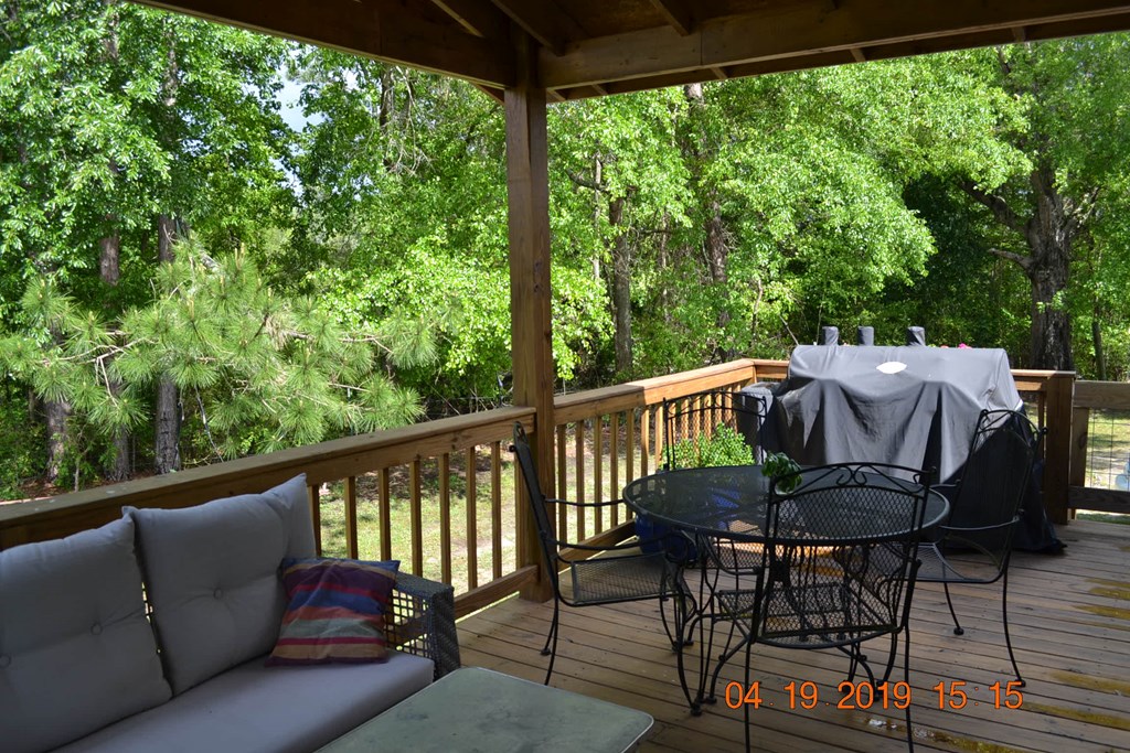 175 Kirkland Road Seale, AL 36875 - Photo 27 of 37 a view of a chair and table on the balcony
