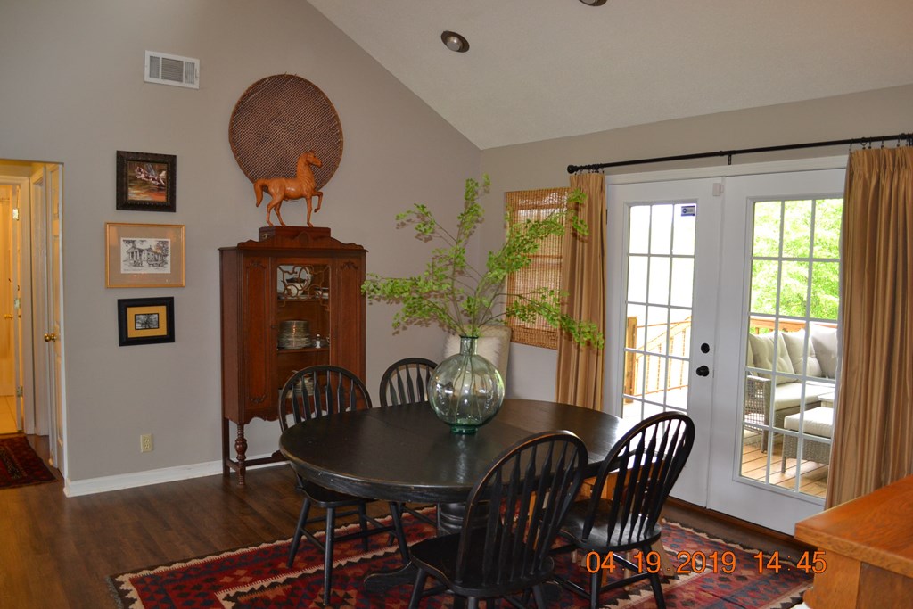 175 Kirkland Road Seale, AL 36875 - Photo 5 of 37 a view of a dining room with furniture window and wooden floor