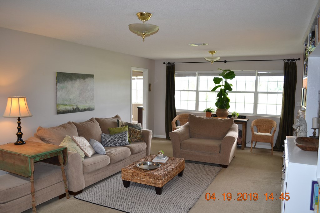 175 Kirkland Road Seale, AL 36875 - Photo 7 of 37 a living room with furniture and a large window