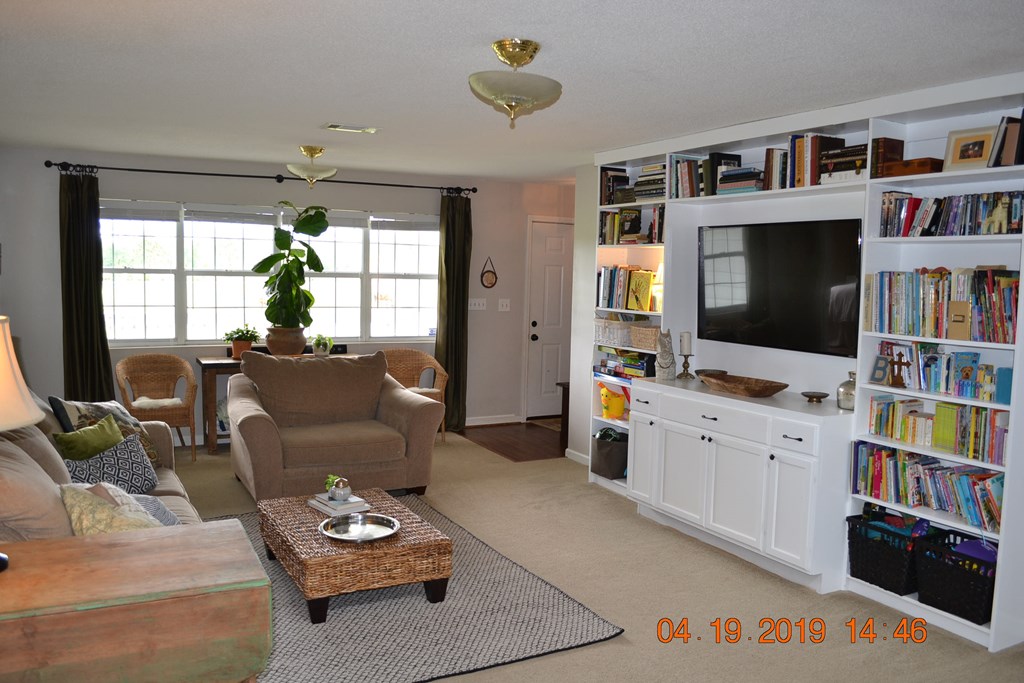 175 Kirkland Road Seale, AL 36875 - Photo 8 of 37 a living room with furniture and a flat screen tv