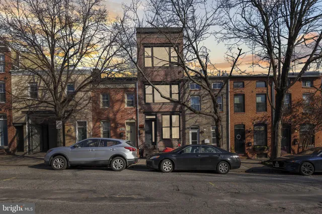 a car parked in front of a house