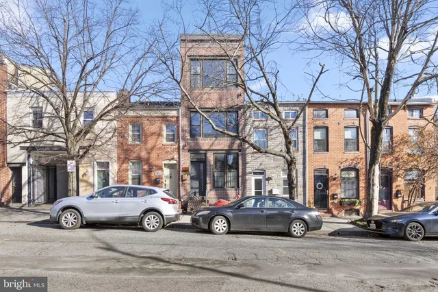 a car parked in front of a building