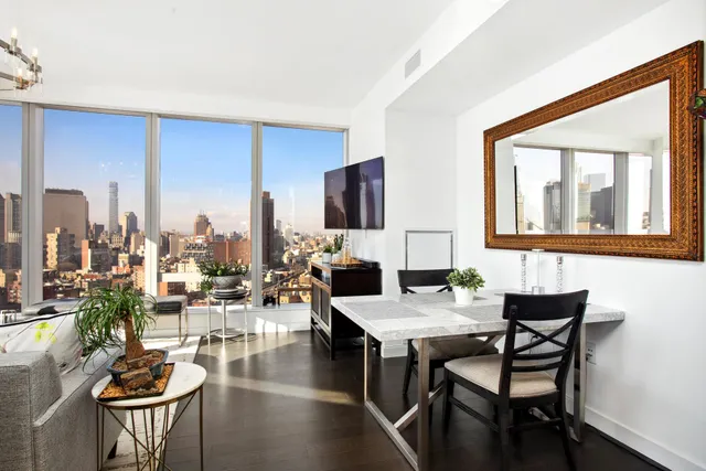 a kitchen with stainless steel appliances a stove and a refrigerator