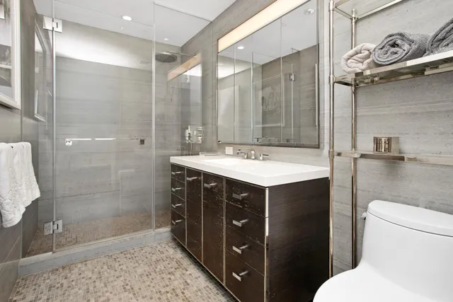 a bed room with furniture and a window